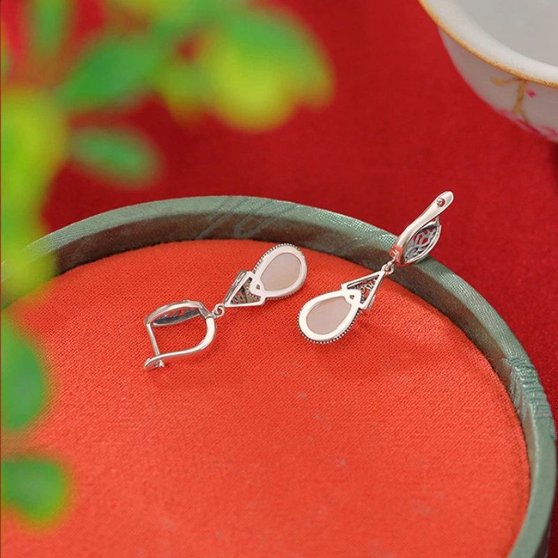 Water-drop-shaped Heitan Jade Earrings (with Hollowed-out Huiwen Pattern Sterling Silver)