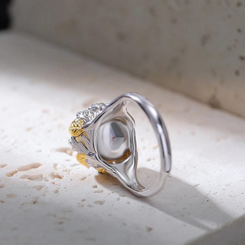 Silver Ring with Freshwater Pearl and Leaf-shaped Setting