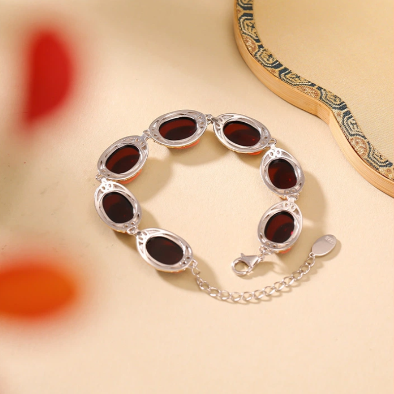 Natural Blood Amber Bracelet (with Silver-Gilded Tang Dynasty Scroll Grass Pattern)