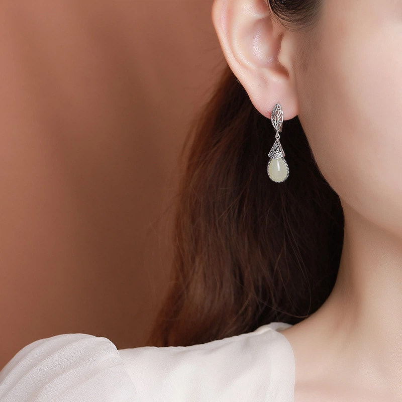 Water-drop-shaped Heitan Jade Earrings (with Hollowed-out Huiwen Pattern Sterling Silver)